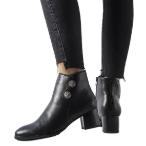 Black insulated boots with a low heel by Guido